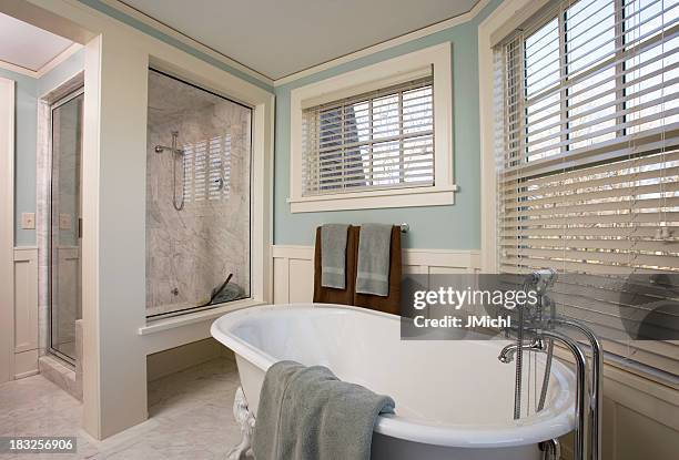 luxury bathroom remodel showing bathtub and shower. - window blinds stock pictures, royalty-free photos & images