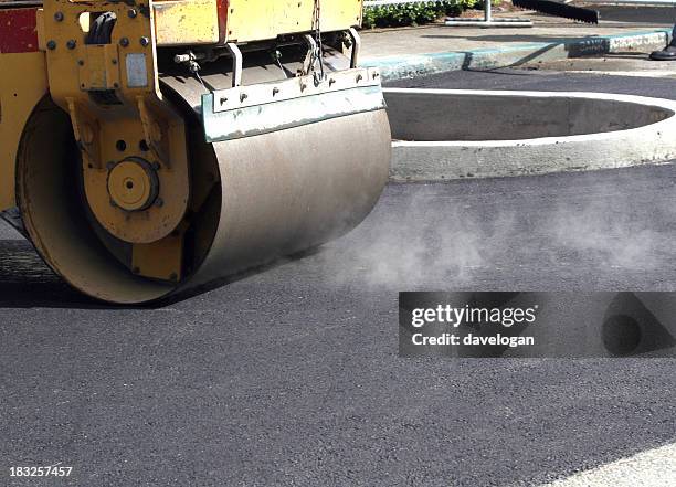 roller on new asphalt - asphalt roller stock pictures, royalty-free photos & images