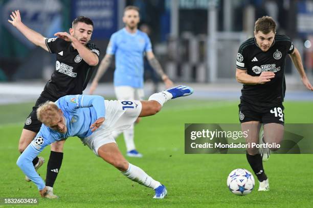 Celtic footballers Greg Taylor , James Forrest and Lazio footballer Gustv Isaksen during the Lazio-Celtic Champions League match at the Olympic...