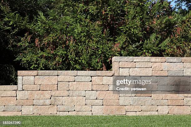 retaining wall with brick blocks - stone slab stock pictures, royalty-free photos & images