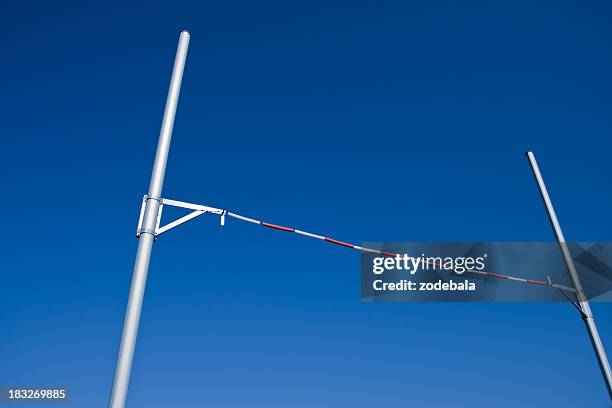 pole vault against blue sky - horizontal bars stock pictures, royalty-free photos & images