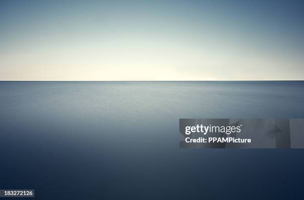 deep blue sea - horizon brightly lit stock pictures, royalty-free photos & images