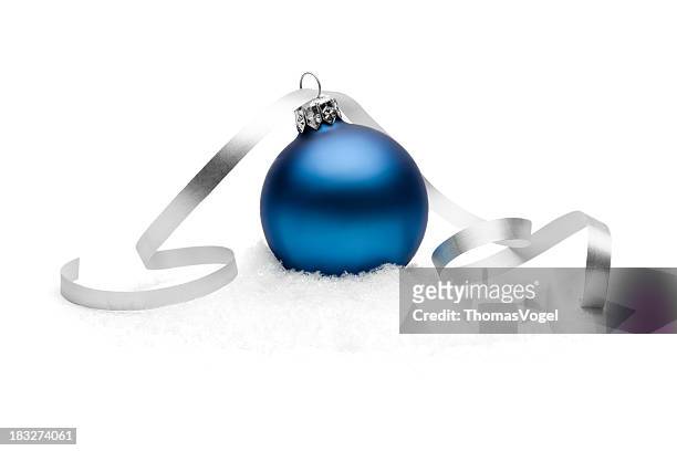 blue christmas bauble on snow - blue baubles stock pictures, royalty-free photos & images