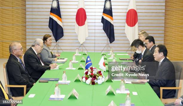 Japanese Prime Minister Fumio Kishida holds talks with Marshall Islands President David Kabua at the premier's office in Tokyo on Dec. 8, 2023.