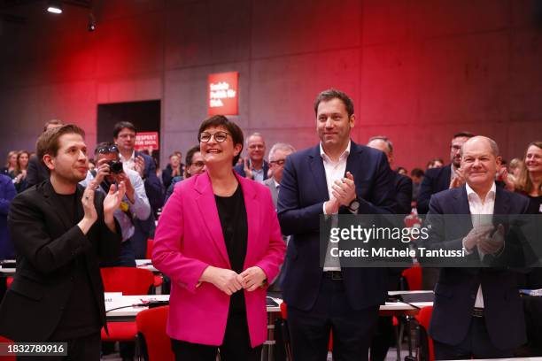 Saskia Esken and Lars Klingbeil, co-chairs of the German Social Democrats celebrate the reelection, as German Chancellor, Olaf Scholz and Kevin...