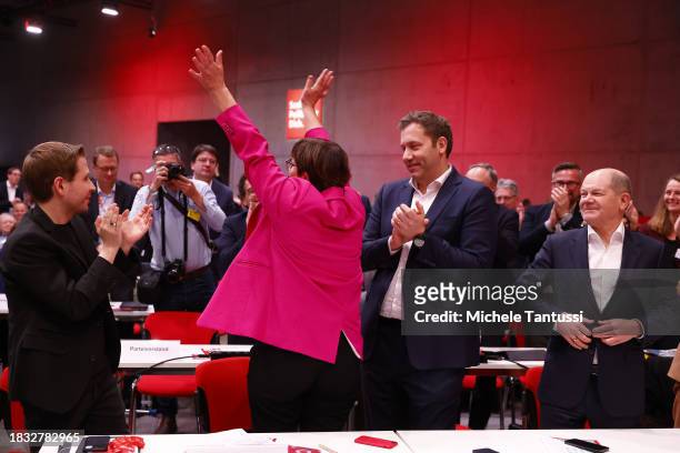 Saskia Esken and Lars Klingbeil, co-chairs of the German Social Democrats celebrate the reelection, as German Chancellor, Olaf Scholz and Kevin...