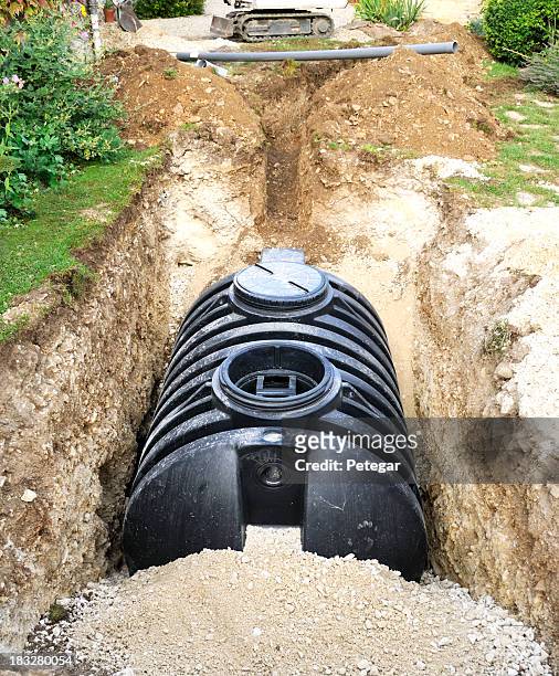 installation of a septic tank - septic tank stock pictures, royalty-free photos & images
