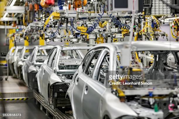 Look at the body shop finish during German Chancellor Olaf Scholz visits the BMW Group car factory on December 05, 2023 in Munich, Germany. His visit...