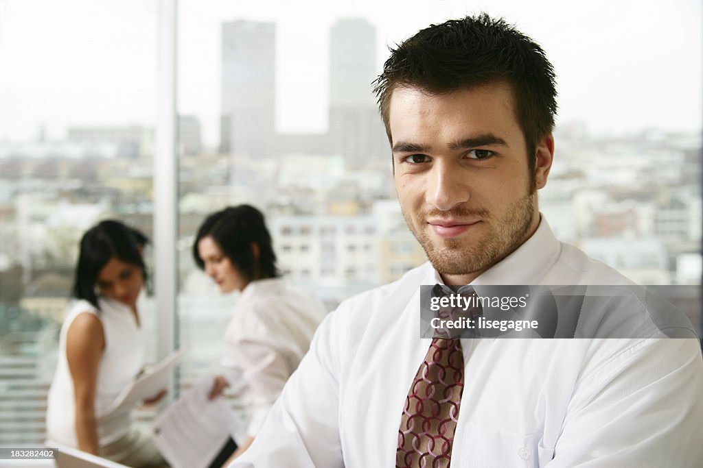 Businessman and colleagues