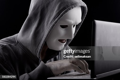 Hekker Computer Computer Hacker With Mask Pressing Komputer Buttons High-Res Stock ...