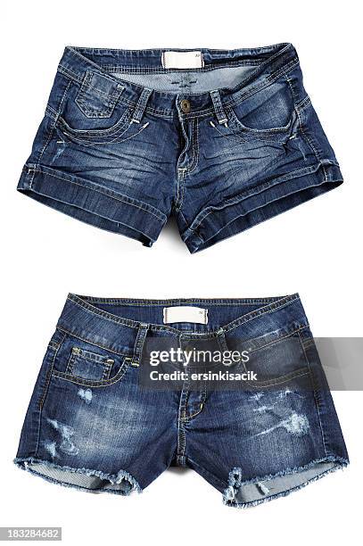 two styles of women's jean shorts - denim shorts stockfoto's en -beelden