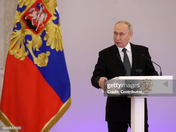 Russian President Vladimir Putin speaks at the Grand Kremlin Palace during the award ceremony, marking the Heroes of Russia Day on December 8 in...