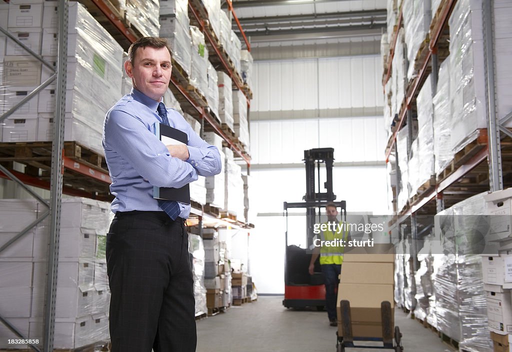 Manger Posing in a Warehouse