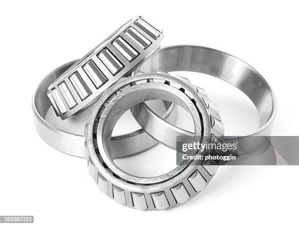 pair of wheel bearings and rings - ball bearing stock pictures, royalty-free photos & images