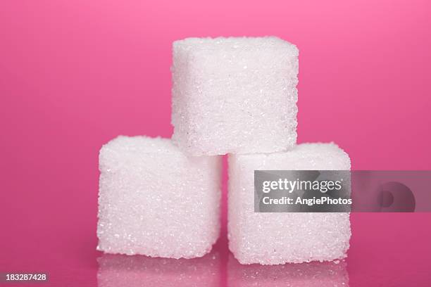 sugar cubes - sugar pile stock pictures, royalty-free photos & images