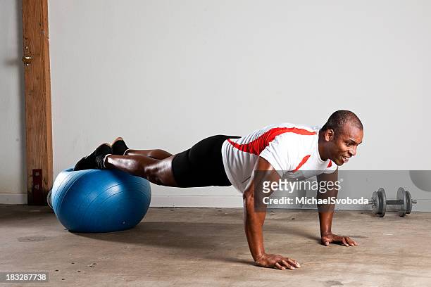 strength training - yoga ball stock pictures, royalty-free photos & images