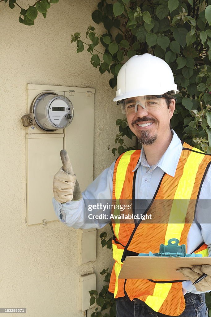 Tech En Meter Electric Technician And Digital Smart Meter High-Res Stock Photo ...