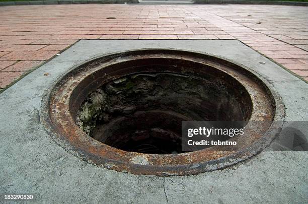 missing manhole cover - manhole stock pictures, royalty-free photos & images