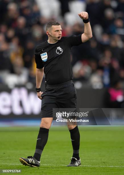 Referee Michael Oliver during the Premier League match between West Ham United and Crystal Palace at London Stadium on December 3, 2023 in London,...