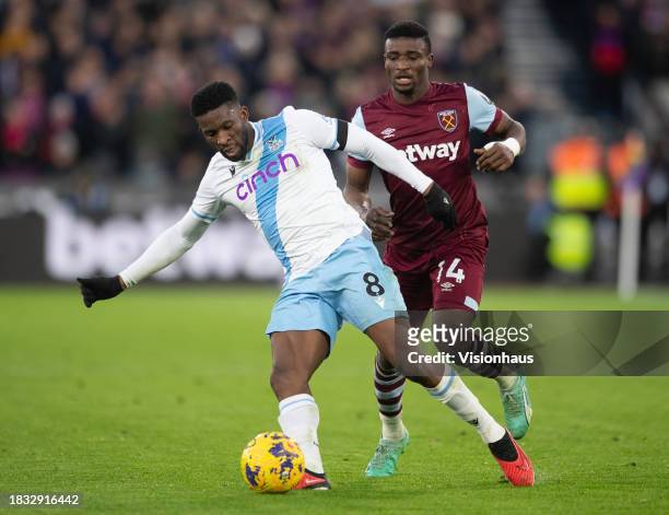 Jefferson Lerma of Crystal Palace holds off Mohammed Kudus of West Ham United during the Premier League match between West Ham United and Crystal...