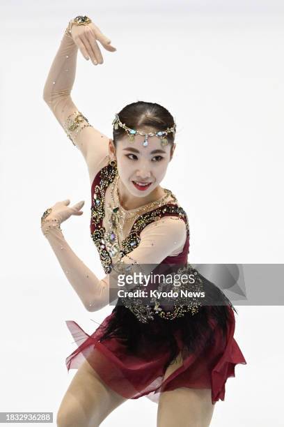 Rion Sumiyoshi of Japan performs in the women's short program at the Grand Prix Final figure skating competition in Beijing on Dec. 8, 2023.