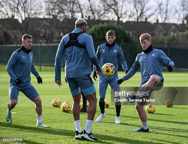 Newcastle United Players seen L-R Emil Krafth, Joelinton, Anthony Gordon and Lewis Hall during the Newcastle United Training Session at the Newcastle...
