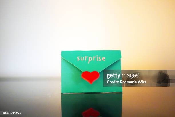 surprise envelope with red heart - gift voucher or card stock pictures, royalty-free photos & images