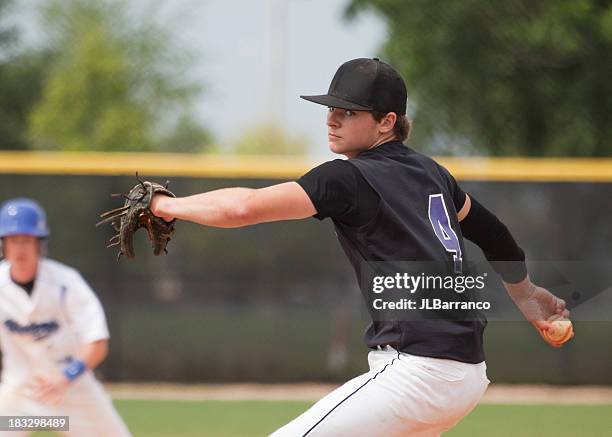 pitcher with determination - baseball pitcher stock pictures, royalty-free photos & images
