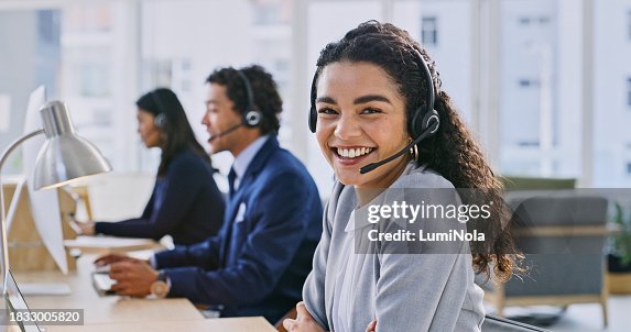 Call center woman, smile and portrait at headphones, job and staff group with computer, advice and office. Telemarketing agent, pc and microphone at help desk, consulting or listen for tech support Call center woman, smile and portrait at headphones, job and staff group with computer, advice and office. Telemarketing agent, pc and microphone at help desk, consulting or listen for tech support