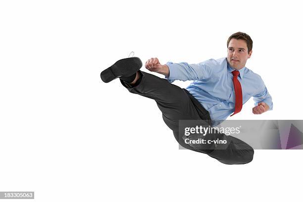 jump kick - karate high kick stock pictures, royalty-free photos & images