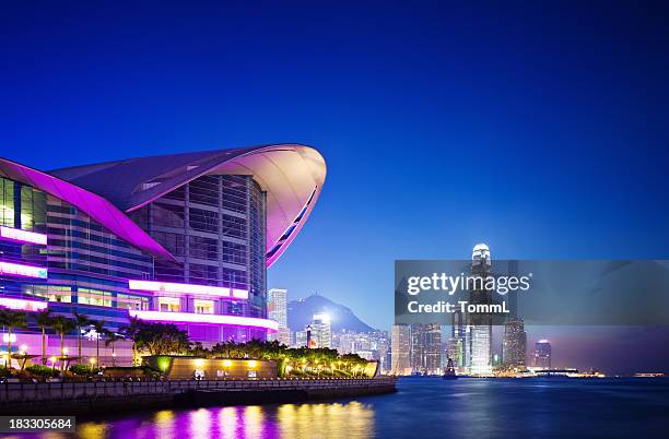 convention center, hong kong - hong kong convention and exhibition centre stock pictures, royalty-free photos & images