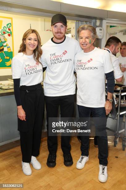 Patricia Caring, Will Poulter and Richard Caring attend The Caring Family Foundation's "Food from the Heart" Campaign at Surrey Square Primary School...
