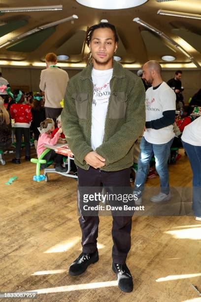 Bluey Robinson attends The Caring Family Foundation's "Food from the Heart" Campaign at Surrey Square Primary School with Bill's, The Ivy, Caprice...