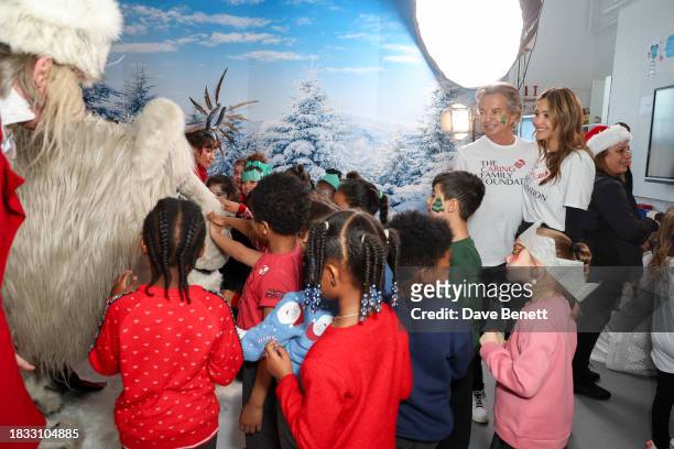 Richard Caring and Patricia Caring attend The Caring Family Foundation's "Food from the Heart" Campaign at Surrey Square Primary School with Bill's,...