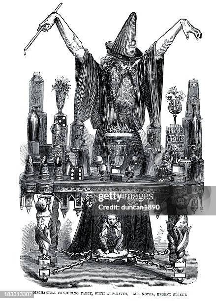 wizard at his conjuring table - merlin the wizard stock illustrations