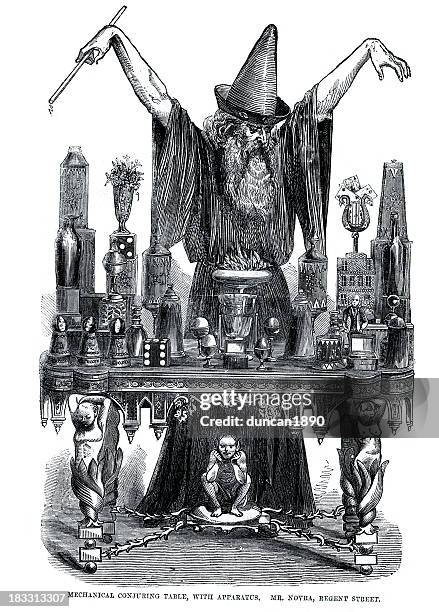 wizard at his conjuring table - wizard stock illustrations