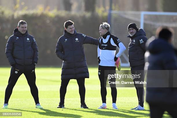 Assistant 1st Team Coach Miguel D'Agostino, Head Coach Mauricio Pochettino, Mykhailo Mudryk and Goalkeeping 1st Team Coach Toni Jimenez of Chelsea...