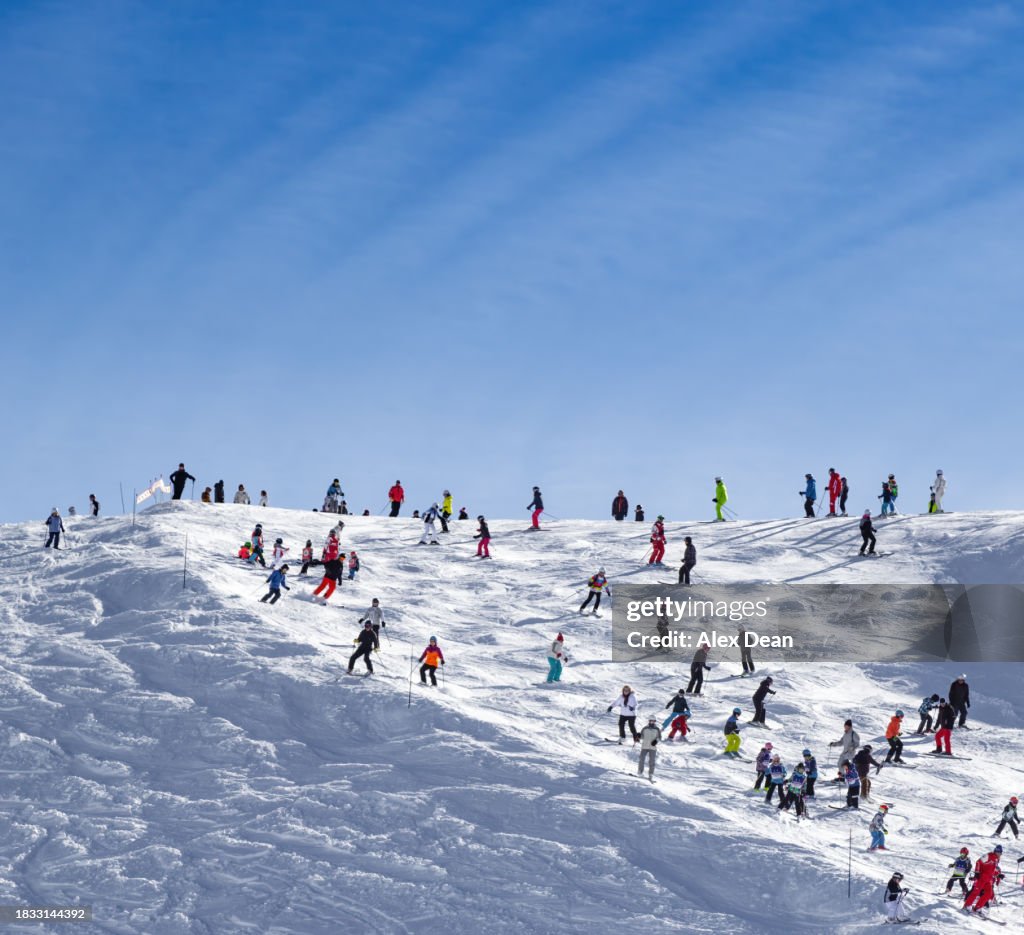 Skiers on a ski slope