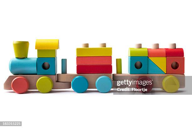 toys: wooden train isolated on white background - miniature train stock pictures, royalty-free photos & images