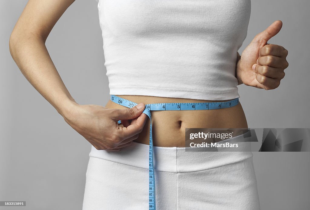 Losing weight thumbs up
