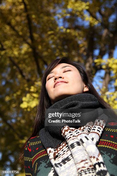 young woman close eyes and deep breathing - xxxlarge - women sunbathing stock pictures, royalty-free photos & images