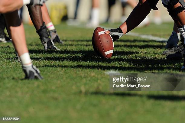 hiking a football - american football stock pictures, royalty-free photos & images