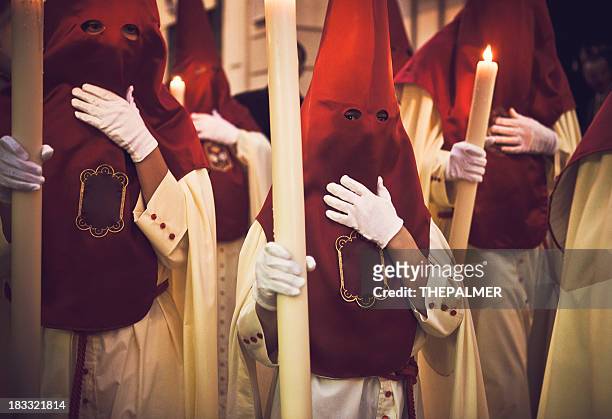 nazarenes during holy week - seville stock pictures, royalty-free photos & images