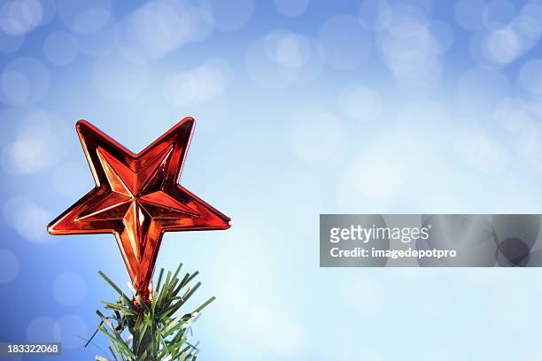 christmas star - tree topper stock pictures, royalty-free photos & images