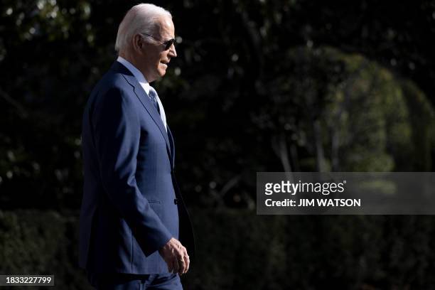 President Joe Biden walks to board Marine One on the South Lawn of the White House in Washington, DC, on December 8, 2023. Biden will travel to Las...