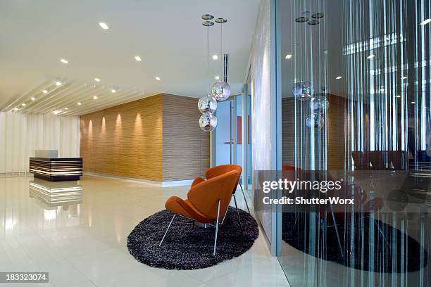 lobby reception & waiting area - red office chair stock pictures, royalty-free photos & images