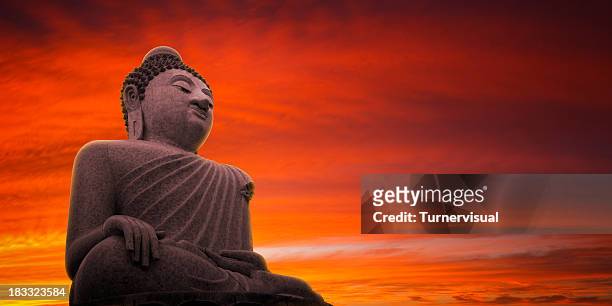 big buddha sunset - buddha face stockfoto's en -beelden