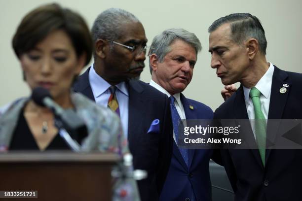 Chairman of U.S. House Foreign Affairs Committee Rep. Michael McCaul talks to Rep. Darrell Issa as ranking member Rep. Gregory Meeks listens during a...