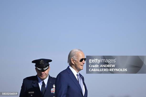 President Joe Biden walks to board Air Force One at Joint Base Andrews in Maryland on December 8, 2023. Biden will travel to Las Vegas, Nevada, to...