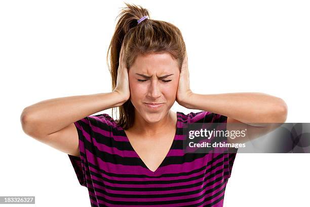 young woman portrait - handen over de oren stockfoto's en -beelden